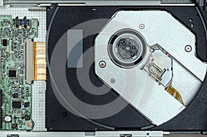 Open optical disc drive on a modern laptop computer without disc.