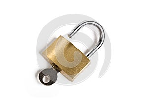 Open padlock with inserted key isolated