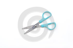 Open pair of scissors with blue handle isolated on white background, top view