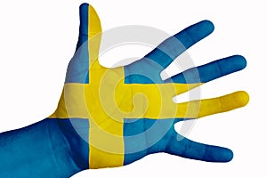 Open palm with the image of the flag of Sweden. Multipurpose concept