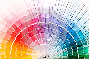 Open Pantone sample colors catalogue. photo