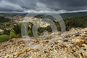 Open pit gold mine in Rosia Montana, Romania photo