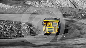 Open pit mine industry, big yellow mining truck for coal anthracite