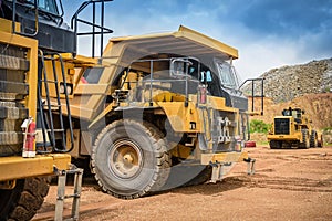 Open pit mine industry, big yellow mining truck for coal anthracite