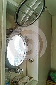 An open porthole in the ship`s