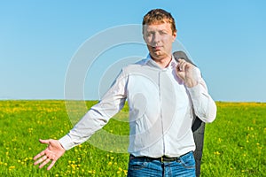 Open posture man in jeans