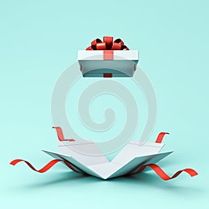 Open present box or blank white gift box with red ribbons and bow on light blue cyan pastel color background with shadow