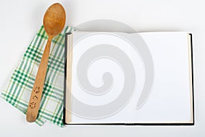 Open recipe book on white background.