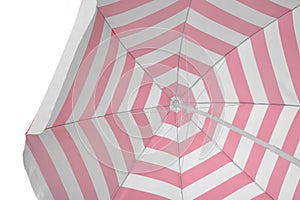 Open red striped beach umbrella isolated on white. Inner side