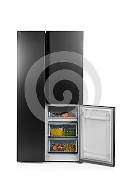 Open refrigerator filled with products isolated