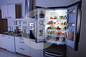 Open Refrigerator In Modern Kitchen