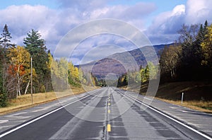 An open road on scenic Route 302 in Crawford Notch, New Hampshire photo