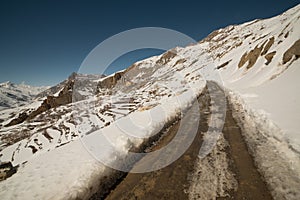 Open road in winter in himalayas of india