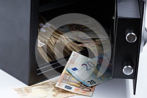 Open Safe Deposit Box, Pile of Cash Money, Euros photo