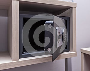 Open safe in the hotel room.