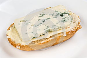 Open sandwich with blue cheese and butter close-up