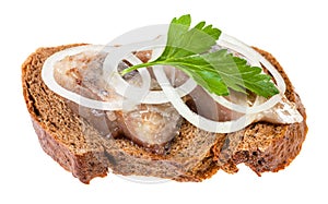 Open sandwich with herring, onion, parsley
