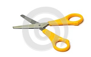 Open scissors isolated on a white