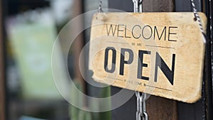 Open sign in coffee shop door , business reopen After Covid-19 outbreak concept