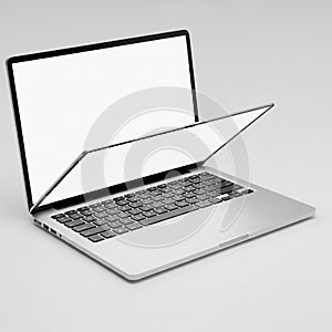 Open Silver Laptop Computer with Blank White Screen and Keyboard on a Light Gray Background