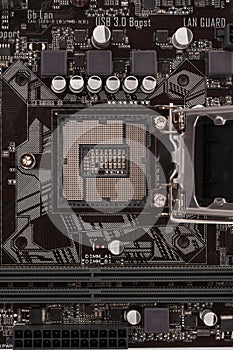 Open socket for processor on motherboard for office PC, close up