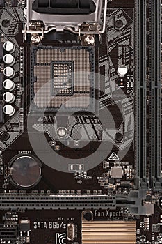Open socket for processor on motherboard for office PC, close up