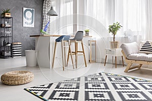 Dining area with white bin photo