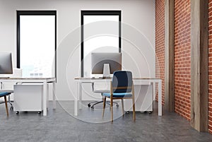 Open space office interior, brick wall