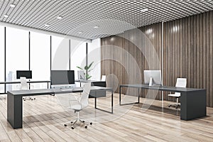 Open space office interior design with city view background from panoramic window, dark furniture and wooden slatted wall, modern