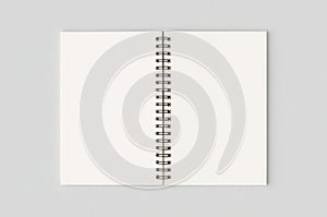 Open spiral notebook page isolated on white background