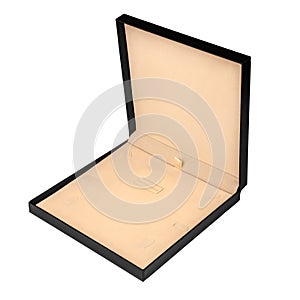 Open square black box with a beige bed for jewelry isolated