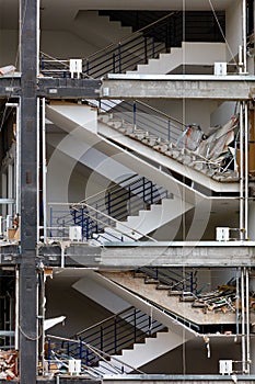 Open stairwells of a concrete building during the renovation of the front of the house