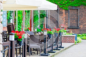 Open street cafe with flowers