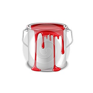 Open tin can with spilled red paint.