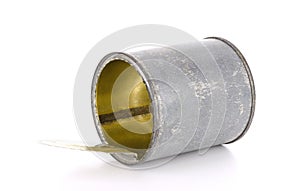 The open tin can on a white