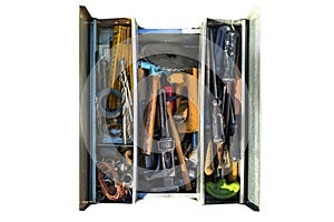 An open tool box with various old tools visible from above, isolated on a white background with a clipping path.
