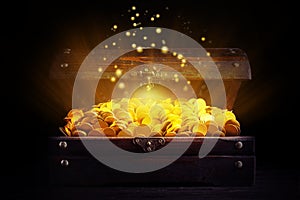 Open treasure chest with gold coins on table against black background