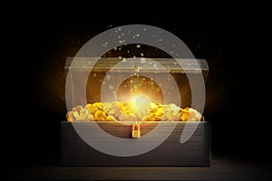 Open treasure chest with gold coins on wooden table against black background