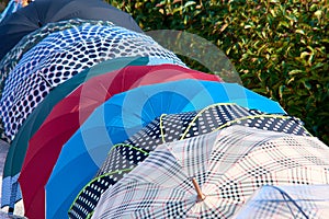 Open umbrellas for sale on Samil beach in Vigo, Pontevedra, Galicia, Spain