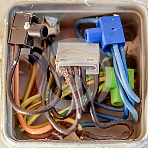 Open unprofessional wired distribution board for the electricity