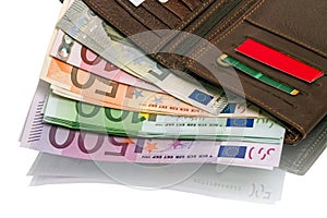 Open wallet with euro banknotes