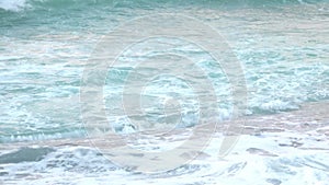 Open water surface of the sea with big waves. Natural background with sun sparkles on the surface of the water