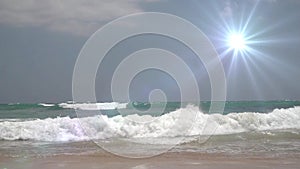 Open water surface of the sea with big waves. Natural background with sun sparkles on the surface of the water