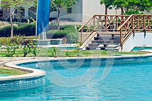 Open water swimming pool with clear water on a sunny day