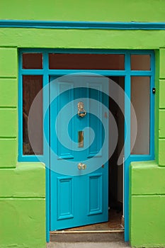 Open welcoming blue door photo