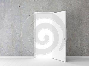 Open white door in empty room with concrete wall