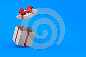 Open white gift box with red bow on blue background. Isolated 3D illustration