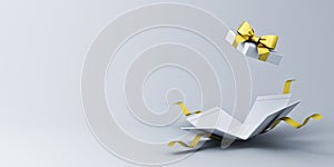 Open white present box or blank gift box with gold ribbons and bow on white grey background with shadow and empty space