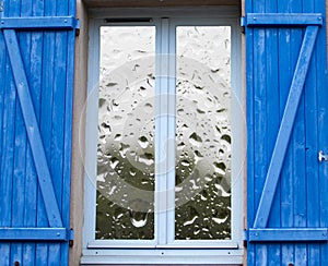 Open Window in the Rain. Window, Water Drops on Glass, Nature, Seasonality