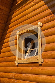 Open window on timber hut